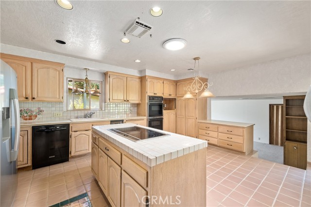 Kitchen looks to step down family room