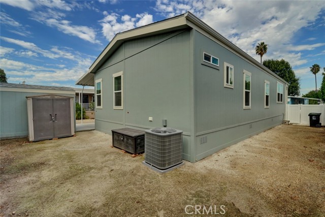 BACK AND SIDE YARD WITH BLOCK FENCING.  READY TO DESIGN IT JUST HOW YOU WOULD LIKE IT.