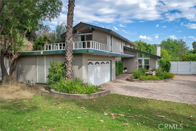 Spacious driveway and roof deck off of upstairs master bedroom.