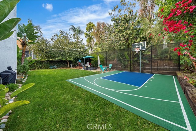 Paint on sports court has been digitally added