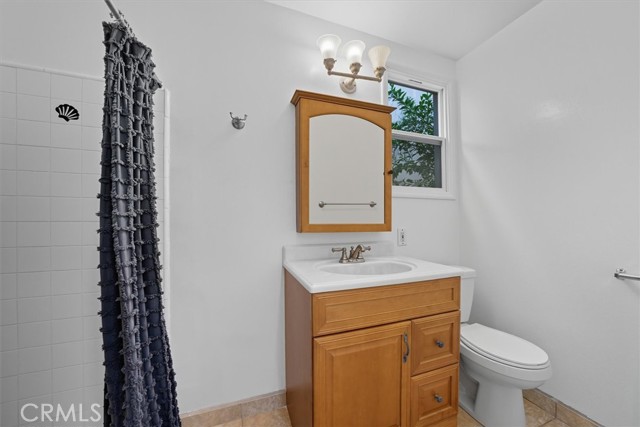 Upper Unit Bathroom 1