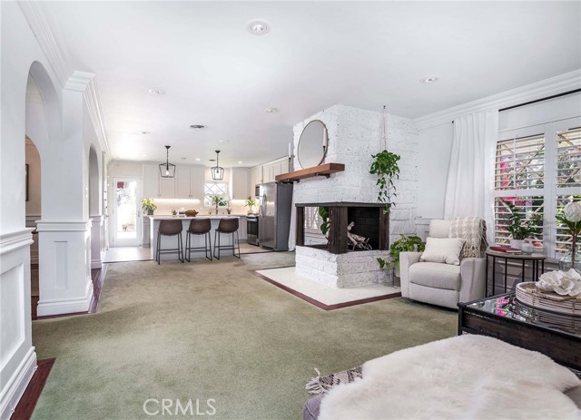 Three sided fireplace... lots of natural light, plenty of room to move! This stunning home has IT ALL!