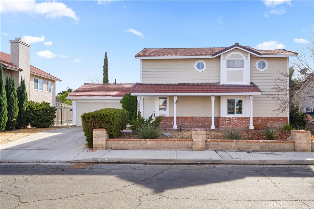 **Charming and Move-In Ready!** Don't miss this beautifully maintained home in the heart of Palmdale—a true must-see! Perfectly situated for commuters with convenient freeway access, this home welcomes you with great curb appeal, highlighted by low-maintenance desert landscaping. 

Step inside to discover updated flooring throughout and a cozy living room featuring a classic brick fireplace and an abundance of natural light from the many windows. The eat-in kitchen overlooks the living room and has been tastefully updated with granite countertops. 

Upstairs, you'll find three spacious bedrooms, including a master retreat with a private balcony overlooking the backyard. The master bath has been upgraded with a stylish shower. Built in 1984, this 3-bedroom, 3-bath home is ready to welcome you. **Welcome Home!**