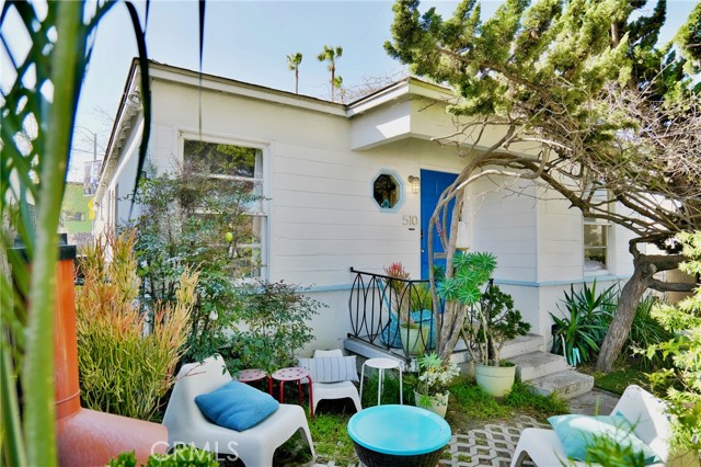 Charming Venice Beach Bungalow located two blocks to the beach and the heart of Abbot Kinney shops, restaurants and cafes. Lush vegetation wraps the house and creates charming outdoor garden seating areas. Currently configured as a 3 bedroom, 2 bath with a private back area that can be combined or left separate as an office or rental space. Original details such as intricate molding, hardwood floors and an octagonal window add to the charm, as well as an exposed cathedral ceiling in the back. The lot is 24% wider than the adjacent bungalows and the typical lot width in the area, making for a more comfortable layout or future development opportunity.  Immediate neighborhood boasts the Venice Farmers Market and the historic Venice Canals, making for a highly walkable lifestyle.
