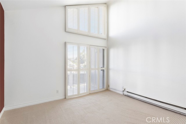 Guest Bedroom with Vaulted Ceilings