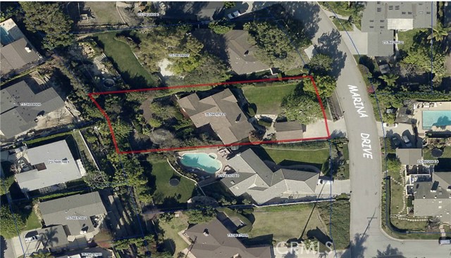 Aerial photograph with property boundaries outlined in red. Plenty of backyard and front yard space.