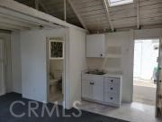 Studio kitchenette and bath entry