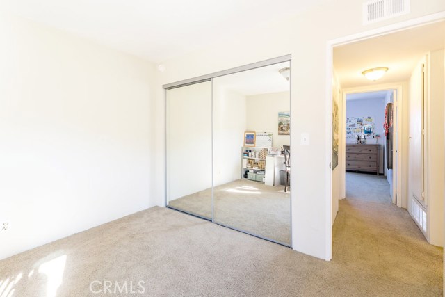 2nd Bedroom w/ Mirrored Closet doors