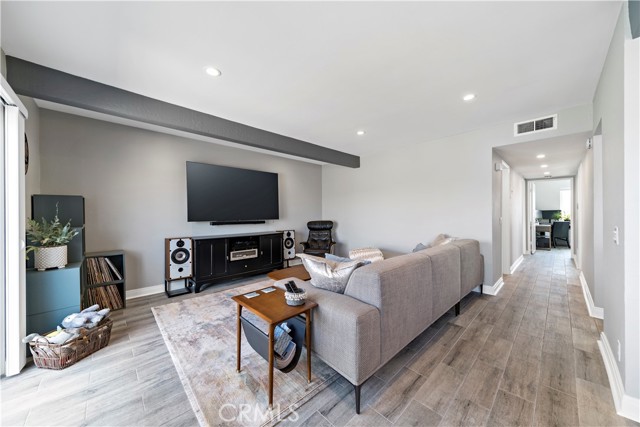 Open Living Room and hallway.