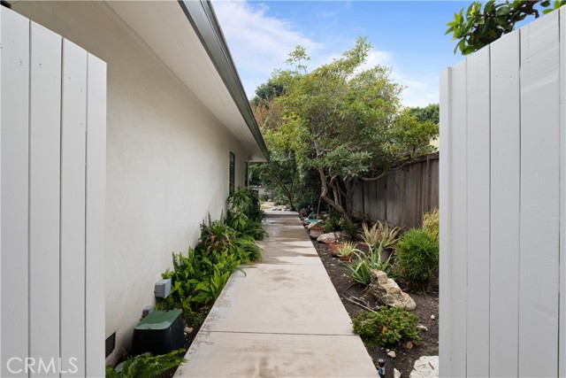 Side Walkway leading from front gate to backyard.