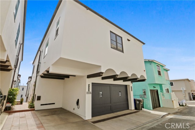 Four car parking spaces including one carport and 2 cars parking garage