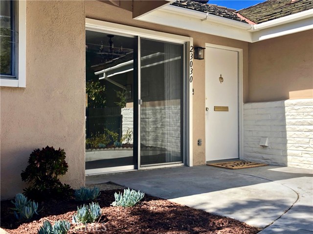 23030 Nadine Circle Torrance, California Priced to Sell!!! Don't Miss!! Sought after Bungalow Unit w/Private Front & Rear Patios. Feels like a Single Family Home. Ideal Location to Activities and Parking within New Horizons South Bay. Private spot with Green Grass and Open Space to the South and West. 2 Nice Sized Bedrooms w/ample Closet Space, 2 Baths, Living Room Fireplace, and Side by Side Unit Laundry Closet. New Carpet and New Interior Paint. Updated Kitchen and Bath Flooring. Updated Kitchen Countertop. New Horizons offers a Clubhouse, 9-hole Golf Course, Putting Green, Pool, and Picnic Area. Other association amenities include a Waterfall Lagoon, Billiard Room, Lounge w/Library, and Big Screen TV, Onsite Sports Center w/Spa, Tennis Court, Gym. Life is Good at New Horizons! Life is even better in a Bungalow!!