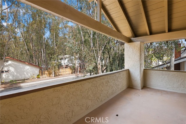 Oversized balcony off master bedroom with endless views of the trees and city lights.