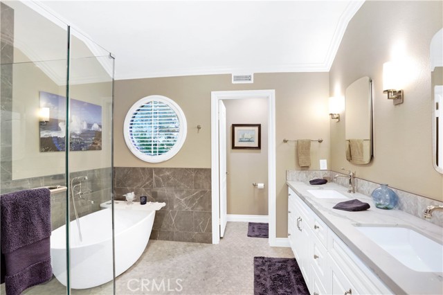 STUNNING upgrades in the primary bathroom.