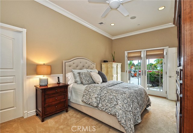 Downstairs bedroom open to pool area