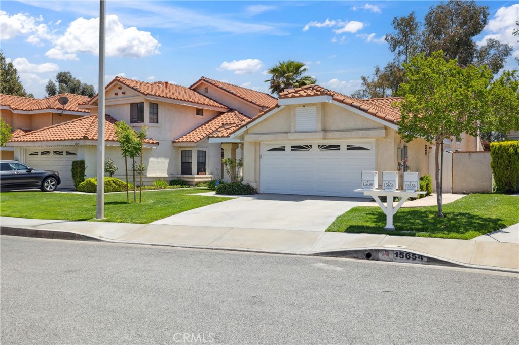 Welcome to 15650 Meadow Drive—Where Pride of Ownership Meets Picture-Perfect Views!

Nestled in one of Canyon Country’s most charming and pride-filled cul-de-sac neighborhoods, this beautifully upgraded home offers the perfect blend of comfort, style, and location. Directly across the street from the community pool, tennis, and pickleball courts, and just minutes from award-winning schools, shopping, and dining—this is the one you've been waiting for!

Step inside to discover a fully remodeled interior featuring a bright, open floor plan with fresh interior paint, recessed lighting, ceiling fans in every room, and a raised kitchen ceiling that enhances the modern feel. The kitchen and guest bathroom have been completely renovated, and the home is fitted with dual-pane, heat-resistant windows, decor light switches, and a wired security and Ring system for peace of mind. Stay comfortable year-round with newly upgraded AC ducting, larger vents, and attic insulation.

Out back, the private yard is an entertainer’s dream with breathtaking views, stamped concrete, a covered patio, custom fire pit, river rock landscaping, planter beds, and a 20x20 concrete slab perfect for outdoor gatherings. Additional highlights include two backyard storage sheds, a new rear fence, and strategic tree removal to maximize the view.

The garage is a standout, featuring built-in cabinets, a pull-down ladder for extra attic storage, and ample space for your tools or toys.

With paid-off solar, upgraded doors (including knife/axe-resistant screen doors), and so much more, this home truly checks all the boxes.

Don’t miss your chance to own this Canyon Country gem—schedule your showing today!