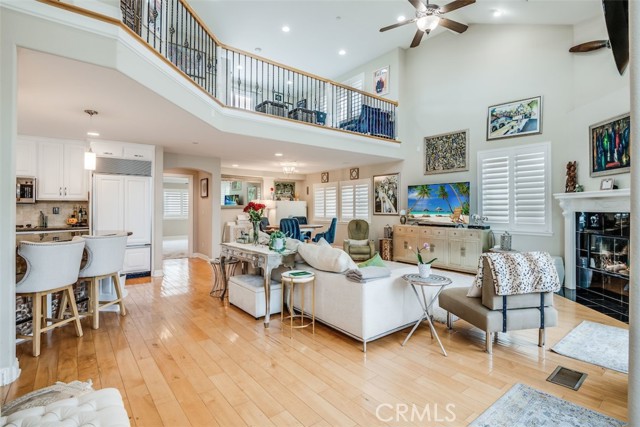 Living room with mezzanine level above