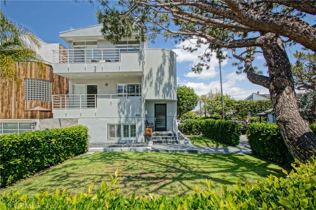 453 Marine Avenue Manhattan Beach, California Beautiful updated 3 bedroom and 4 bath home in the highly sought after Manhattan Beach Sand section. 2,054 sq ft on an oversized corner lot (30'x106'). Enjoy sunset and ocean views from the front deck and relax in the front yard (yes, yard!) Centrally located walking distance to award winning Grandview elementary school, downtown MB, parks, greenbelt, and the BEACH! updated kitchen and baths, gorgeous hardwood floors and newer exterior paint. 4 CAR PARKING!!! An all around great home in an excellent location...