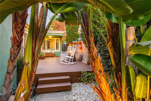 Entryway and side outdoor seating area