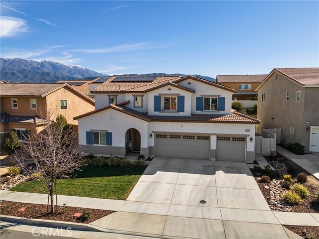 This Spectacular  JP Ranch home sits on a premium and private lot. It is in a highly desirable gated community. This wonderful  floorpan is rarely offered for sale and features  5 large bedrooms, 3 baths and  a loft.   The garage has 3 spaces and is fully finished.  The home was  built in 2016 and is on a beautiful level lot. Pride of ownership shows throughout the home.  . The high ceilings and abundance of windows allow  natural light to flow into each room.  The open floorpan is over 3100 square feet with a large open family room, delightful itchen with a center island and warm cocoa tonedcabinets topped with honey colored granite counter tops.  The kitchen and bath lighting have been  upgraded to  LED lighting. The flooring is an upgraded laminate in warm wood tones that compliment the cabinetry.  There is also a formal dining room, downstairs office/ bedroom with a full bath. The downstairs closet has additional storage. Upstairs is a large master suite that includes an open entrance to the master bedroom from the master bath. The master bath is spacious and has an extremely large walk in closet. Perfect for a growing family the other 3 bedrooms up are spacious and connect to an large loft area - great for an extra family room or play room. For your laundry needs it has an upstairs laundry room.   The backyard is an entertainers delight complete with an beautiful covered patio and concrete deck.  block wall planters and designer grounds for landscaping.  Plenty of room for outdoor entertaining. Sellers installed solar in 2018.  Did I mention this wonderful home has a large 3 car garage . The home sits in the coveted community of JP Ranch. The HOA covers the gated grounds, pool, spa, playgrounds, a dog park and a club house. Call for your private showing. This home is prefect for a work from home or a commuter as the 10 and 60 freeways are just minutes away. This home is upgraded and has been lovingly cared for. I am proud to present to you 1283 Pinehurst Drive Calimesa, CA.