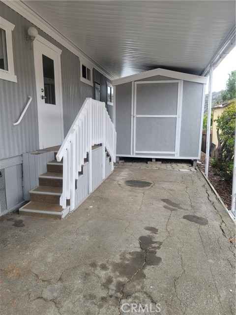 Carport Entry & Large Shed