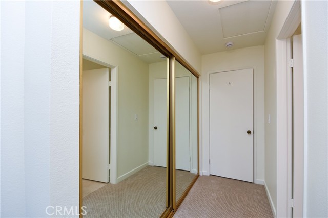 Primary bedroom with mirrored closet