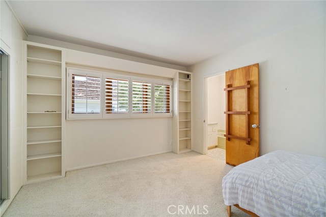 Bedroom #3 with built-in shelves