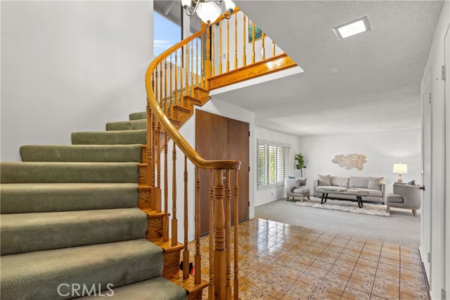 Let's walk up the Custom Spiral staircase and check out all 4 bedrooms!