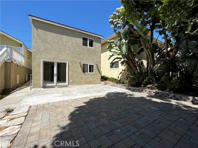 Back of home - large brick patio