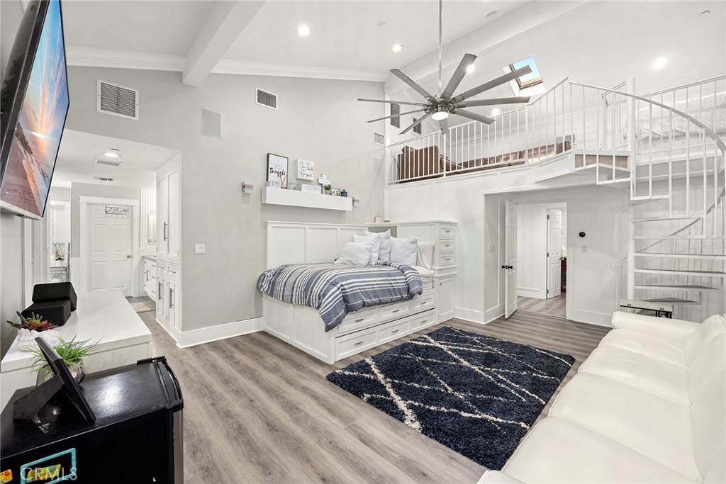 This Bedroom also could be a great BONUS ROOM and has a large LOFT AREA that in this picture has a sectional & bed in it.
Still has room left in it.