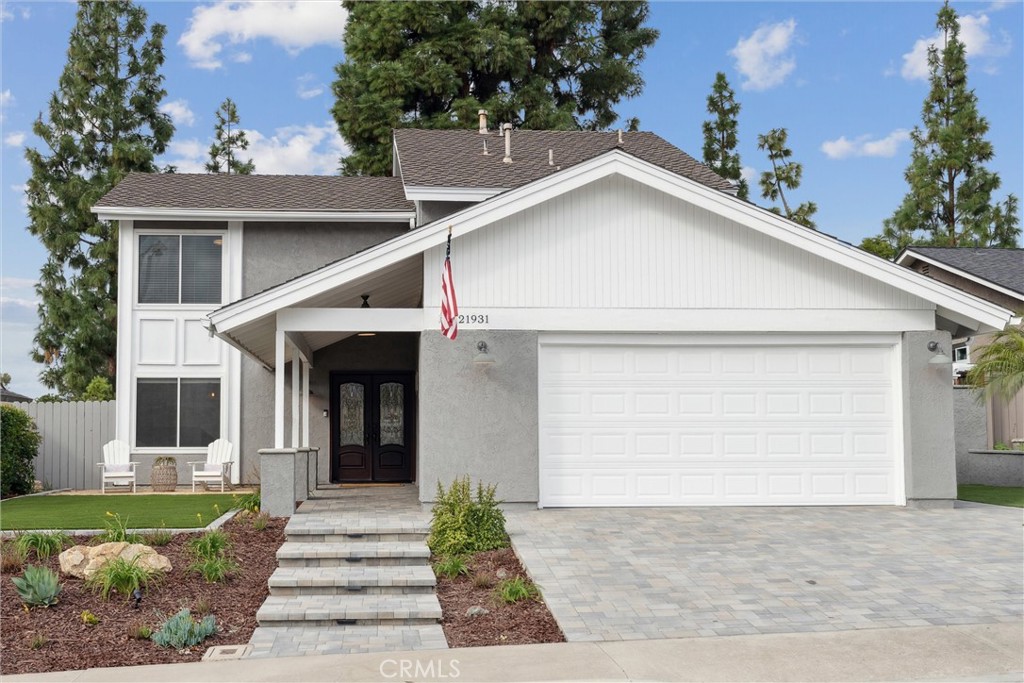 Beautifully updated turnkey home in family-friendly neighborhood! Gorgeous custom stonework on driveway/exterior entry and new landscaping makes this home stand out from the moment you see it. A double door entry leads you into the formal dining and living areas with brand new luxury vinyl floors, neutral paint palette, high ceilings, and plenty of natural light. The charming family room has a cozy fireplace. Updated kitchen features granite countertops, white cabinets, gas cooktop, stainless steel appliances including a wine refrigerator, and room for bar stools. Kitchen is open to the family room and has views to the backyard. Beautifully updated staircase takes you to the second floor where there are three bedrooms including the primary master suite. The primary master suite has a walk-in closet and updated bathroom with double vanity. Spacious backyard has drought-tolerant plants and low-maintenance landscaping, covered patio with TV, child/pet friendly turf, built-in BBQ, and private spa with fence/gate. Garage features epoxy floors and storage area. Home belongs to the Sun and Sail Club that features pools, tennis and pickleball courts, gym, and community events. Great location within walking distance to schools, parks, and local shopping centers. Rent includes all appliances, weekly gardener, weekly spa service, and HOA dues for access to Sun and Sail Club. This home is a must see!