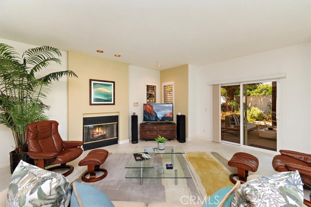 Family room includes limestone floors and family room