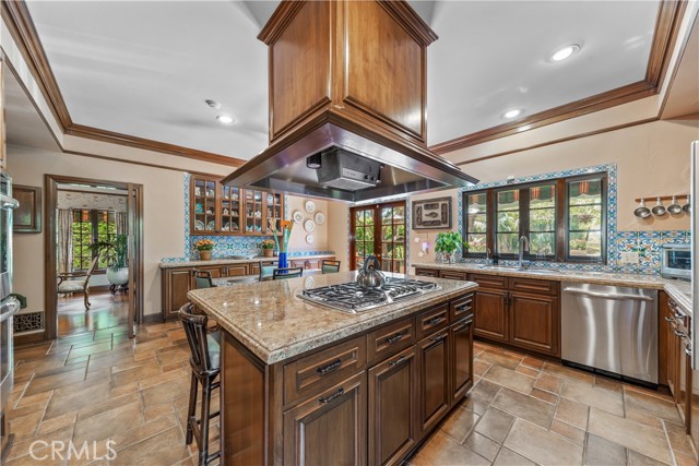 Prepare meals while guests chat around the bar