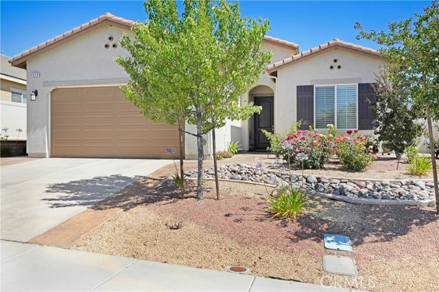 1578 Timberline Beaumont, California Welcome to 1578 Timberline! This gorgeous turnkey home is located in the adult 55+ four seasons gated community in Beaumont. This home features 2 large bedrooms, 2 full size bathrooms, a bonus room, high ceilings, recess lighting, a large open kitchen & family room, large walk-in pantry, an indoor laundry room complete with cabinets and a sink. Upgrades include tile flooring throughout, plantation shutters throughout most of the windows, granite counters and an epoxy finish to the garage floor. No expenses were spared with the exterior landscaping. Exterior upgrades include a large alumawood patio cover complete with a ceiling fan, raised cinder block planters, exterior rain gutters, decorative rock ground cover in areas of the front and back yard, colored stamped concrete floor throughout the backyard patio and in front and side walkways. This gated four seasons community features 3 Clubhouses, 6 miles of Hiking Trails, an indoor and outdoor swimming pool, heated Spa, tennis courts, Billiards, bocce, ping pong, a library, a bistro Restaurant and much more!