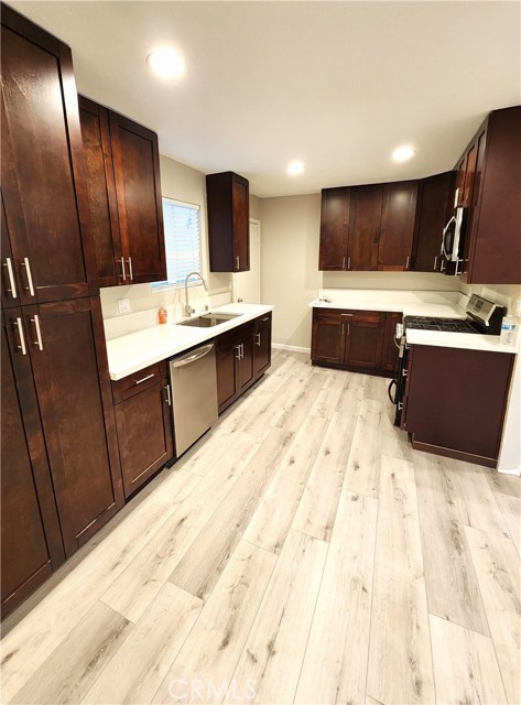 Nice cabinetry and quartz counters.