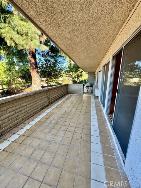 Tiled patio just off the living room—ideal for outdoor entertaining and relaxing in style.