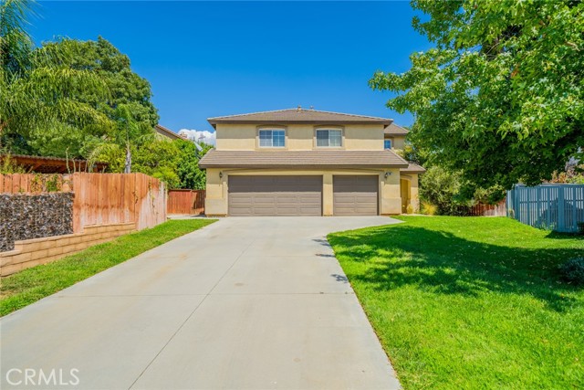 Welcome to this 5 bedroom, 2.5 bath, 2,123 sq ft home in the highly desirable Oak Valley Greens Neighborhood located at the end of the cul-de-sac with a large wrap-around yard on a 9,000 sq ft lot.  Are you looking for a home that has room for RV or Boat space,  look no further.  There is a long driveway that can fit multiple vehicles plus a 3-car garage.     As you enter the home, you are greeted with an open floor plan with a living room/dining room combo flowing into the family room by an open pony wall and adjacent to the kitchen.   The kitchen features an island, stainless steel appliances, abundant cabinet space, and a walk-in pantry. There are 2 separate direct access doors to the 3-car garage.    All 5 bedrooms, 2 baths, and a convenient laundry room are on the 2nd floor. The master bedroom has a vaulted ceiling, ensuite bath with dual sinks, water closet, shower/jet tub combo with custom tile, and a walk-in closet. Other features are a whole house fan, an Alumnawood patio that covers the full length of the home, matching laminate flooring on the first floor and all-new carpet on the second.   Updates include Brand New Interior Paint and Brand New Carpeting. Close proximity to stores, freeway, and walking distance to Fallen Heroes Park.  No HOA and low property taxes keep your payments low.