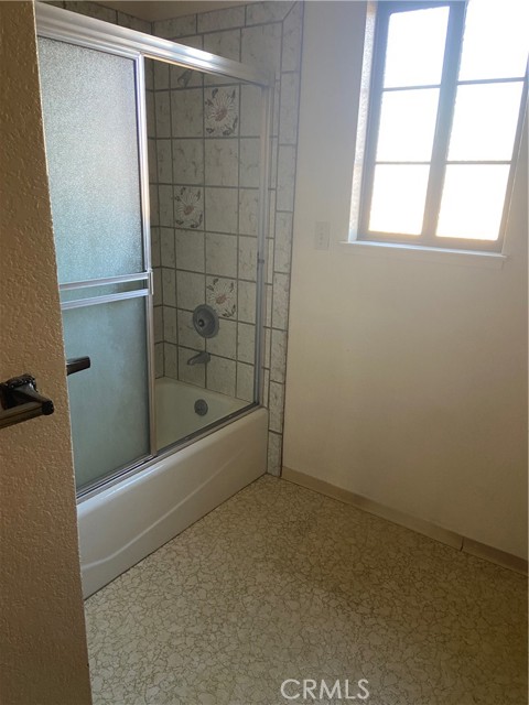 Upstairs bath room. Shower over tub.