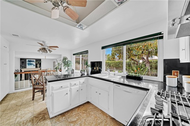 The kitchen id open the the separate family room.