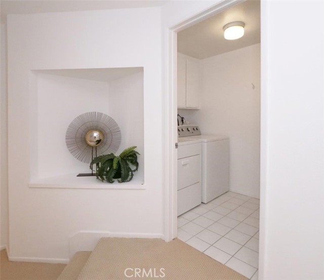 Full Sized Laundry Room with a Sink