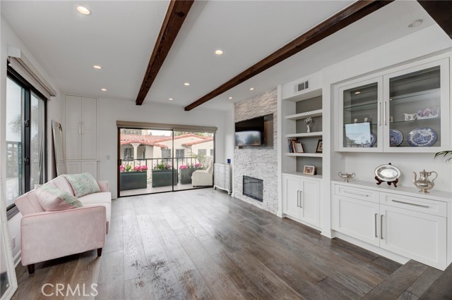 Remodeled living area with beautiful wood beams