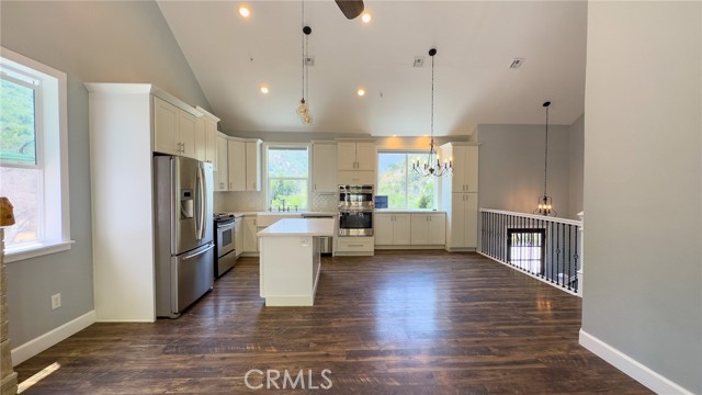 ANOTHER VIEW OF THE KITCHEN.