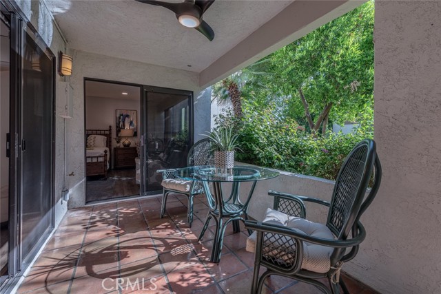 Ceiling fan in outside patio and beautiful ambient natural light.