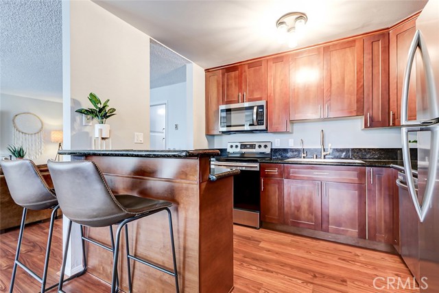 View of Dining Area and Kitchen from Front Door