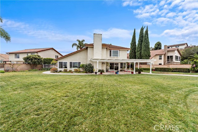 Large grass yard separate from the pool.