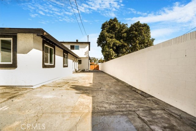 View of back unit and front 2 story unit from driveway