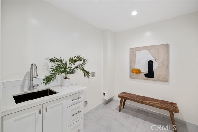 Spacious Laundry Room with Utility Sink