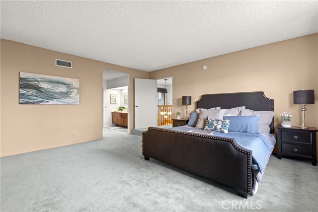 A Large ensuite bath with your own HUGE walk-in closet.  This bedroom set is a Cal King.  Plenty of room for a loveseat or chair against the Bathroom wall.