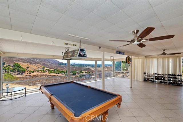 Billiard table in bonus room will stay with the home