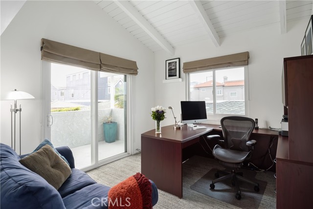 Bedroom #3 currently an office.  Balcony 
overlooks backyard